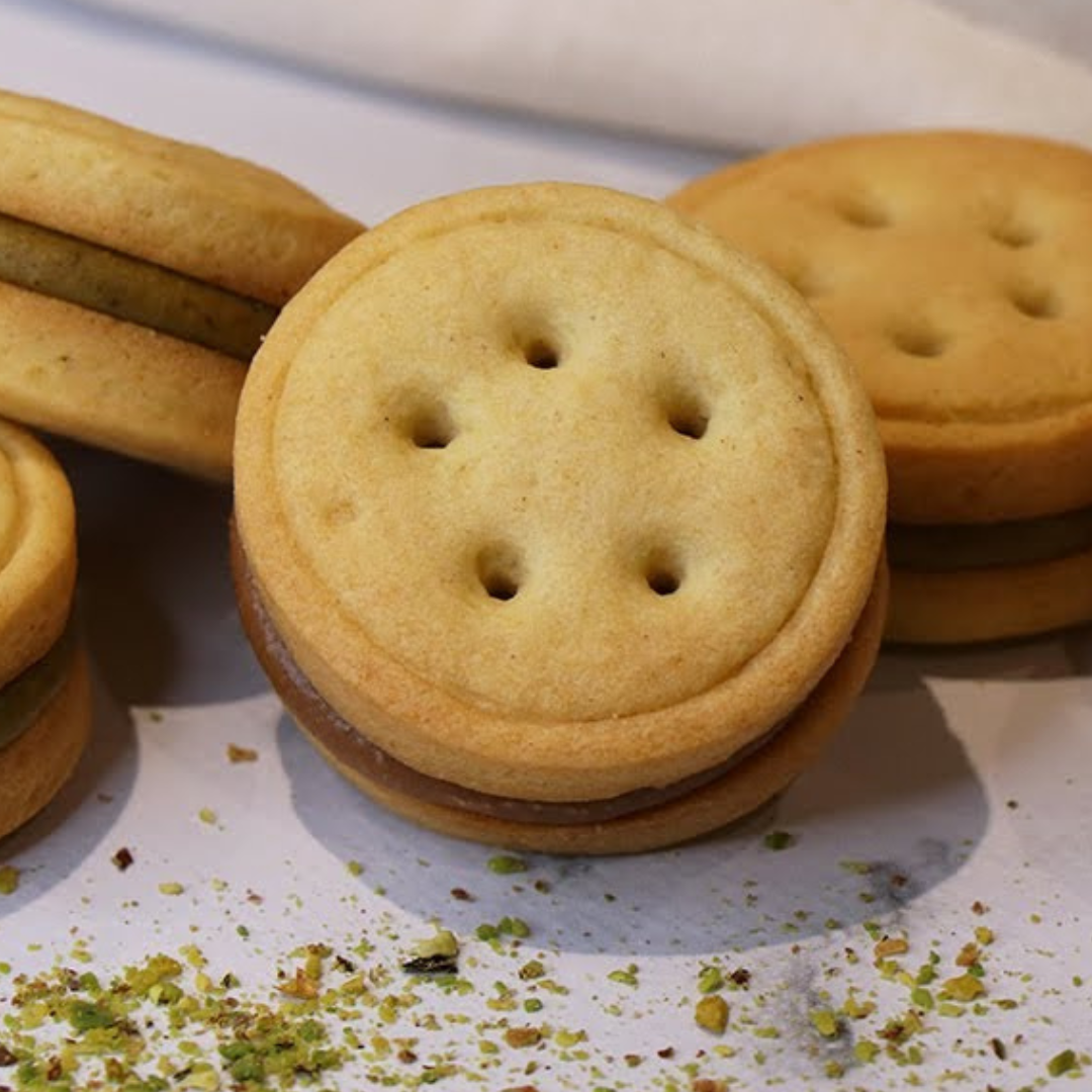 Baiocchi maison, recette Baiocchi, biscuits italiens, biscuits sablés fourrés, Baiocchi pistache, Baiocchi chocolat au lait, recette biscuits maison, biscuits gourmands, recette italienne sucrée, biscuits faits maison